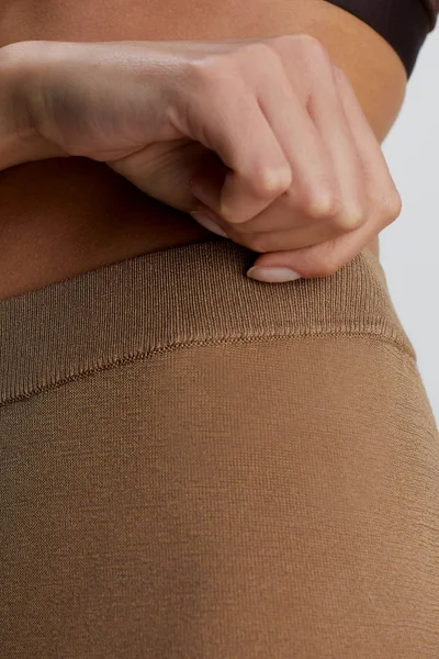 Beige dámské lehké kalhoty Calvin Klein s průsvitným povrchem