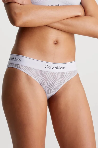 Průhledné krajkové kalhotky Calvin Klein s podpisovým pasem