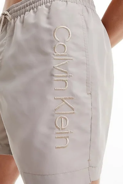 Pánské koupací kraťasy - ABM - béžová - Calvin Klein