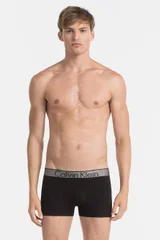 Bílé pánské boxerky Calvin Klein s nápisem v pase