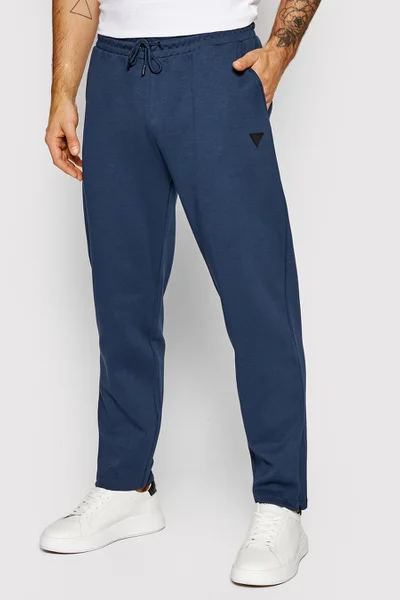 Pánské teplákové kalhoty  - G7R1 - Tmavě v modré barvě - Guess